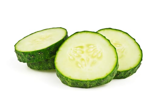 A few slices of cucumber on white background