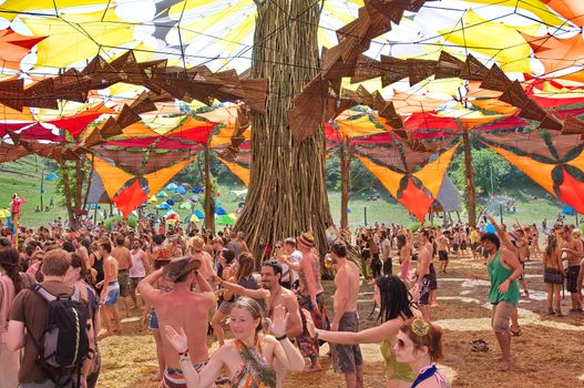 OZORA, HUNGARY - AUGUST 01: People dancing on Ozora Festival, one of the greatest psychedelic music gathering in Euorpe. Ozora, Hungary, Europe August 01, 2014.