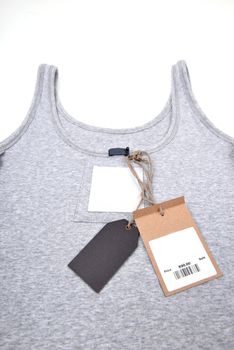 undershirt with price tag on white background