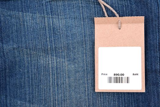price tag with barcode on  jeans textured