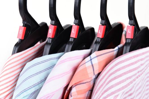clothes shop with shirt hanged on stand
