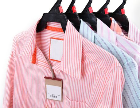 clothes shop with shirt hanged on stand