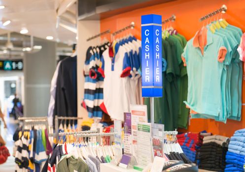 clothes shop with shirt hanged on stand