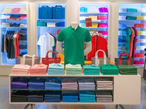 clothes shop with shirt hanged on stand