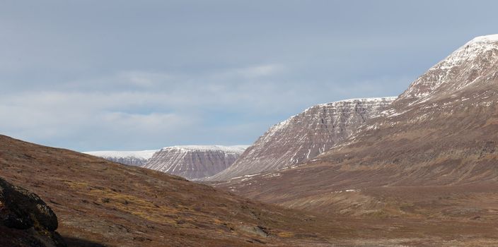 Arctic landscape in Greenland around Disko Island with mountains in summer