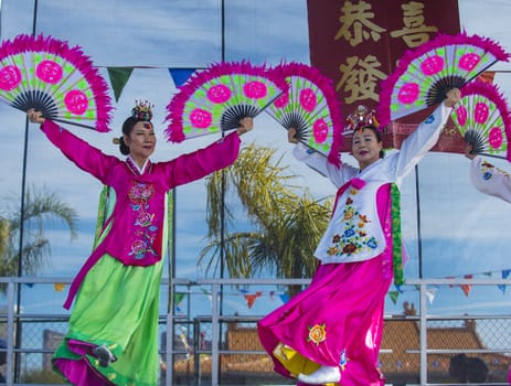 LAS VEGAS - FEB 09 : Chinese folk dancers perform at the Chinese New Year celebrations held in Las Vegas , Nevada on February 09 2014