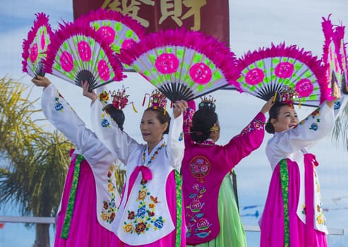 LAS VEGAS - FEB 09 : Chinese folk dancers perform at the Chinese New Year celebrations held in Las Vegas , Nevada on February 09 2014