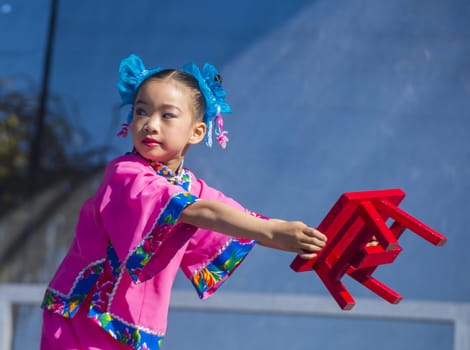 LAS VEGAS - FEB 09 : Chinese folk dancer perform at the Chinese New Year celebrations held in Las Vegas , Nevada on February 09 2014