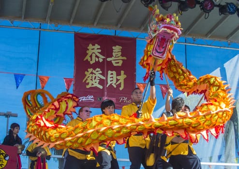 LAS VEGAS - FEB 09 : Dragon dance performers during the Chinese New Year celebrations held in Las Vegas , Nevada on February 09 2014