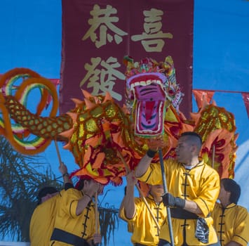 LAS VEGAS - FEB 09 : Dragon dance performers during the Chinese New Year celebrations held in Las Vegas , Nevada on February 09 2014