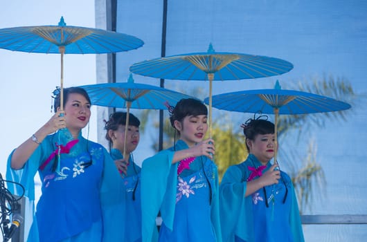 LAS VEGAS - FEB 09 : Chinese folk dancers perform at the Chinese New Year celebrations held in Las Vegas , Nevada on February 09 2014