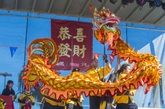 LAS VEGAS - FEB 09 : Dragon dance performers during the Chinese New Year celebrations held in Las Vegas , Nevada on February 09 2014