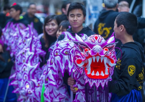 SAN FRANCISCO - FEB 15 : An unidentified participants in a Dragon dance during the Chinese New Year Parade in San Francisco , California on February 15 2014 , It is the largest Asian event in North America 