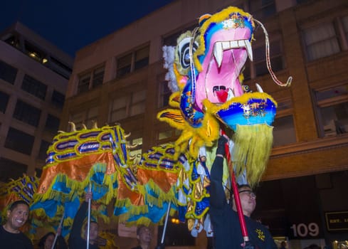 SAN FRANCISCO - FEB 15 : An unidentified participants in a Dragon dance at the Chinese New Year Parade in San Francisco , California on February 15 2014 , It is the largest Asian event in North America 