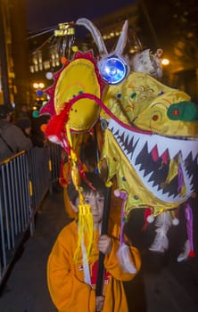 SAN FRANCISCO - FEB 15 : An unidentified participants in a Dragon dance at the Chinese New Year Parade in San Francisco , California on February 15 2014 , It is the largest Asian event in North America 