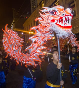 SAN FRANCISCO - FEB 15 : An unidentified participants in a Dragon dance at the Chinese New Year Parade in San Francisco , California on February 15 2014 , It is the largest Asian event in North America 