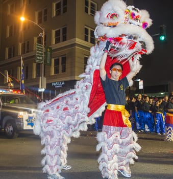 SAN FRANCISCO - FEB 15 : An unidentified participant in a Lion dance at the Chinese New Year Parade in San Francisco , California on February 15 2014 , It is the largest Asian event in North America 
