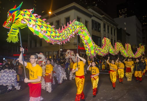 SAN FRANCISCO - FEB 15 : An unidentified participants in a Dragon dance at the Chinese New Year Parade in San Francisco , California on February 15 2014 , It is the largest Asian event in North America 