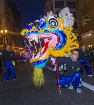 SAN FRANCISCO - FEB 15 : An unidentified participants in a Dragon dance at the Chinese New Year Parade in San Francisco , California on February 15 2014 , It is the largest Asian event in North America 