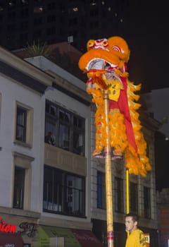 SAN FRANCISCO - FEB 15 : An unidentified participant in a Lion dance at the Chinese New Year Parade in San Francisco , California on February 15 2014 , It is the largest Asian event in North America 