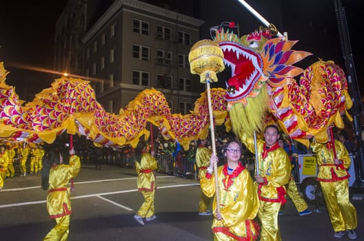 SAN FRANCISCO - FEB 15 : An unidentified participants in a Dragon dance at the Chinese New Year Parade in San Francisco , California on February 15 2014 , It is the largest Asian event in North America 