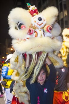 SAN FRANCISCO - FEB 15 : An unidentified participant in a Lion dance at the Chinese New Year Parade in San Francisco , California on February 15 2014 , It is the largest Asian event in North America 