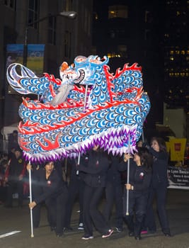 SAN FRANCISCO - FEB 15 : An unidentified participants in a Dragon dance at the Chinese New Year Parade in San Francisco , California on February 15 2014 , It is the largest Asian event in North America 