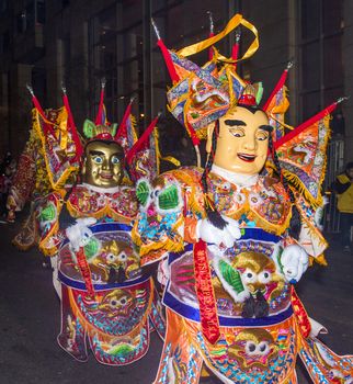 SAN FRANCISCO - FEB 15 : An unidentified participants with traditional man-size costumes at the annual Chinese new year parade on February 15 2014 on San Francisco , California