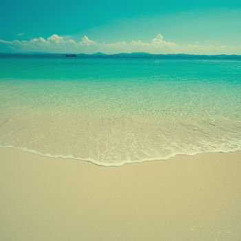 Vintage beach scene in hot day, tropical island Malaysia.