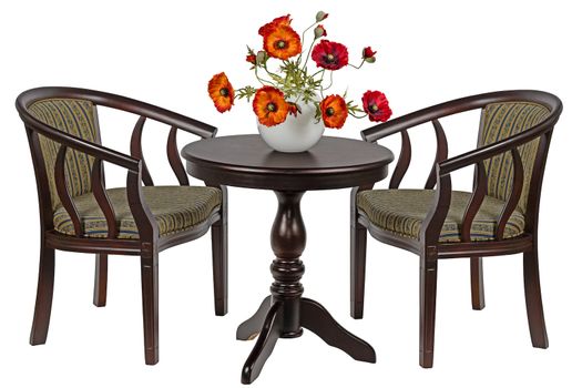Bouquet of artificial poppies in a vase on the round table, isolated on white background
