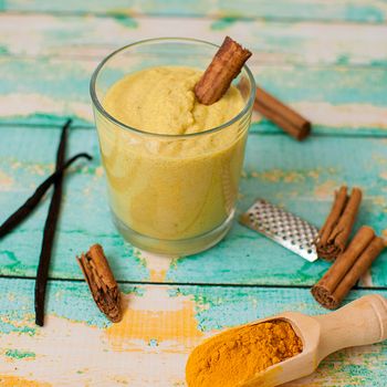 healthy smoothie with turmeric, vanilla, cinnamon and coconut milk