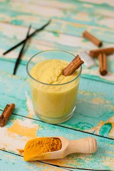 healthy smoothie with turmeric, vanilla, cinnamon and coconut milk