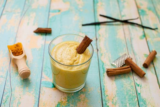 healthy smoothie with turmeric, vanilla, cinnamon and coconut milk