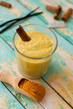 healthy smoothie with turmeric, vanilla, cinnamon and coconut milk