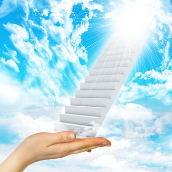 Hand hold stairs in sky with clouds and sun. Concept background