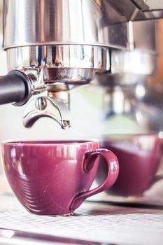 Purple cup of hot coffee, stock photo