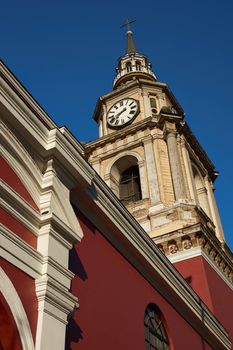 Clock tower of the historic San Francisco church in central Santiago, Chile