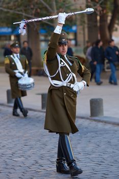 Leader of the Carabineros Band marching as part of the changing of the guard ceremony at La Moneda in Santiago, Chile