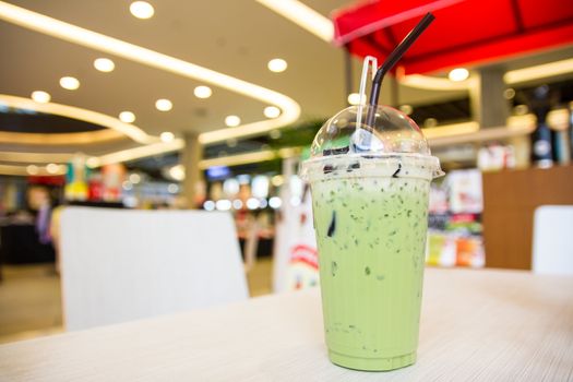 Ice milk green tea with grass jelly topping