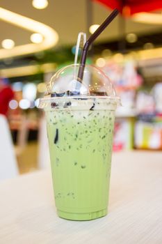 Ice milk green tea with grass jelly topping