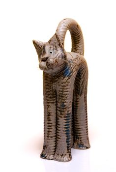 Cat figurine on white background