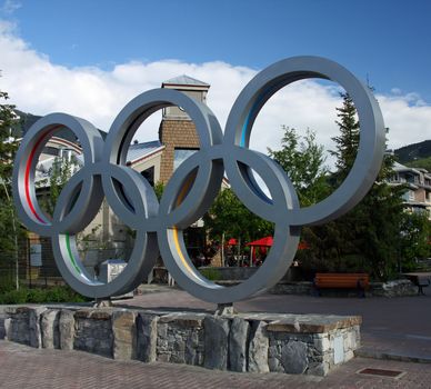 WHISTLER VILLAGE - JUL 12: Olympic rings in Whistler Village, site of the 2010 Winter Olympics and Paralymics. Taken July 12, 2011 in Whistler Village, British Columbia, Canada.