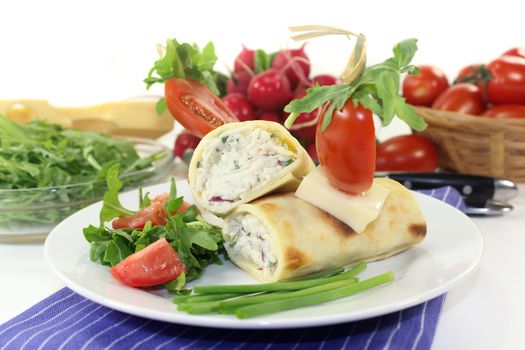 a crepe stuffed with cheese, radishes and chives