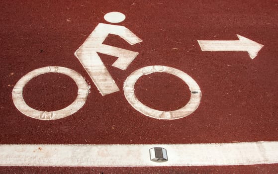 Bicycle road sign and arrow in outdoors