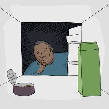 Worried Black man looking at food in open refrigerator