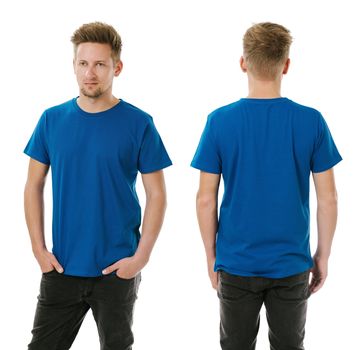 Photo of a man wearing blank royal blue t-shirt, front and back. Ready for your design or artwork.