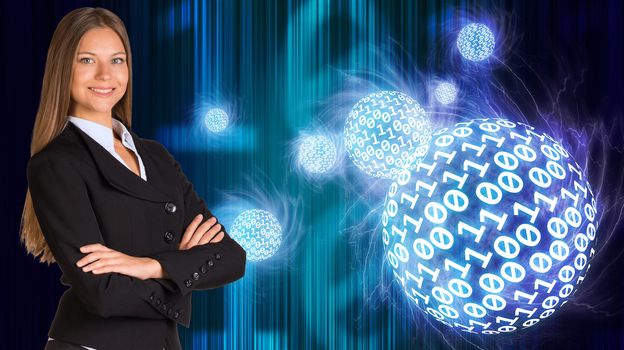 Businesswoman in a suit. Spheres of glowing digits on background