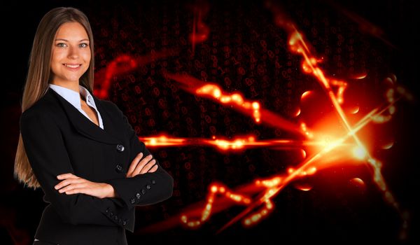 Businesswoman in a suit and glow rays. Business concept