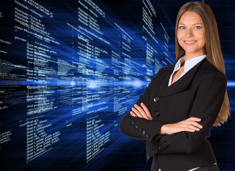 Businesswoman in a suit with background of glowing digital code. Business concept