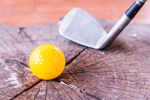 Still life Yellow Miniature Golf Ball On White Background.